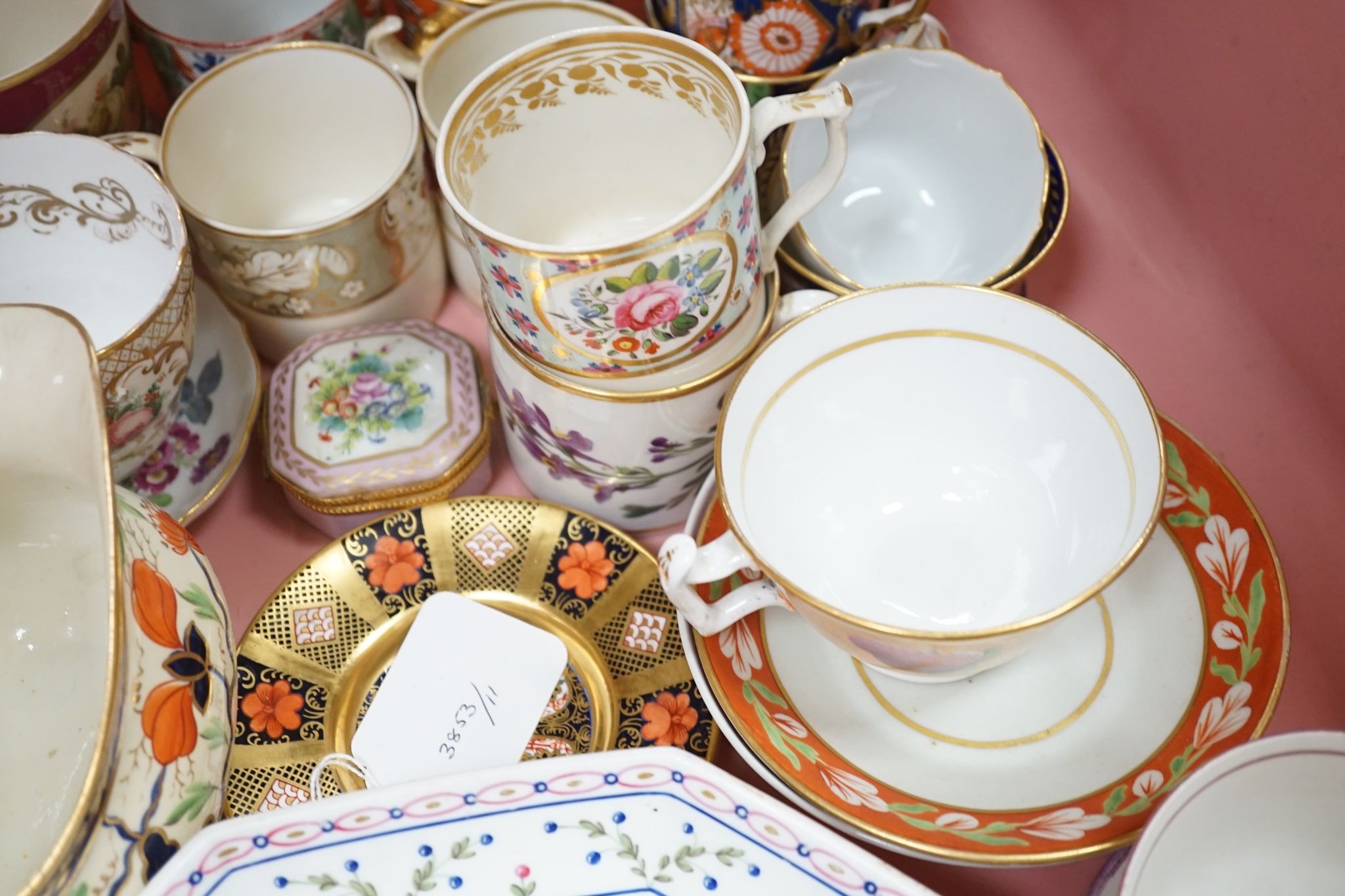 A collection of 19th century English porcelain tea and coffee cups, saucers and other tableware including Royal Crown Derby etc.
